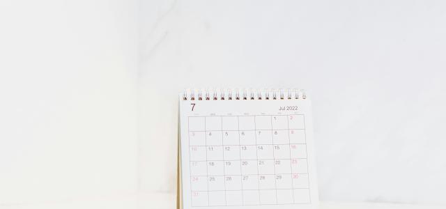 a calendar sitting on top of a table by Blessing Ri courtesy of Unsplash.